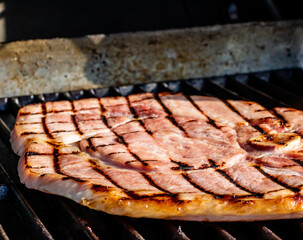Ham steak on the grill. Calgary, Alberta, Canada