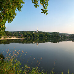 landscape with lake, church, river