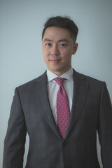 Headshot of Asian businessman
