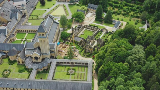 Abbey in 4k. Aerial photography. View from above. Top view of the abbey. Ruined abbey. Historical places. Destructive building. Abandoned. Belgium