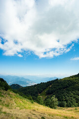 panorama from the top of mount mottarone in italy with a view of the valley below