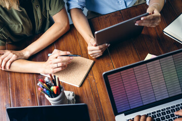 Group of young people working together. Creative business people in modern office. Hipster team in...