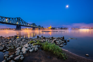 bridge over Vistula river in early misty morning. Wloclawek, Poland