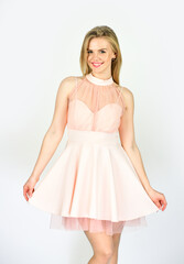 Naklejka premium Lovely dress. pretty girl looking stylish. fashion and beauty. hairdresser salon for every woman. female beauty. tender makeup concept. beautiful woman in sexy dress. smiling lady with blonde hair