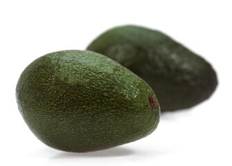 AVOCADO persea gratissima AGAINST WHITE BACKGROUND