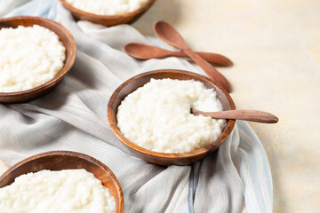 rice porridge in wood bowl