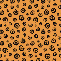 floral animal print (jaguar) seamless repeat pattern in next-level black and iced mango