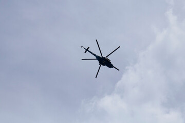 helicopter against the blue sky