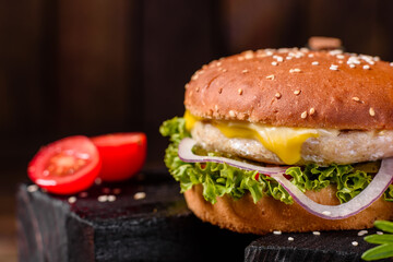 Delicious fresh homemade burger on a wooden table
