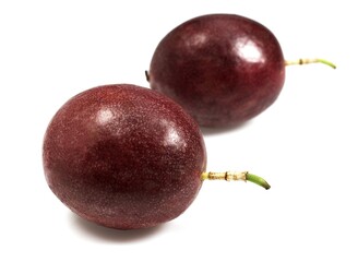 PASSION FRUIT passiflora edulis AGAINST WHITE BACKGROUND