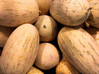 ripe melons on the counter of a health food store