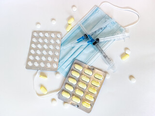 COVID - syringes, mask and medicine