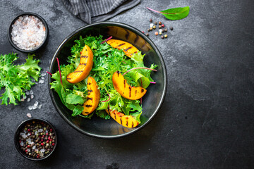 grilled peach salad lettuce leaves mix nectarine ingredient organic eating healthy top view place for text copy space keto or paleo diet raw