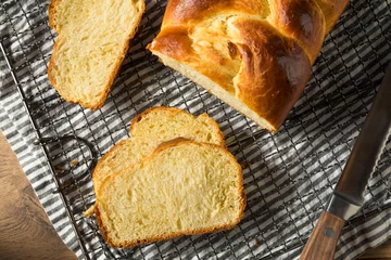 Fotobehang Homemade Baked Braided Brioche Bread © Brent Hofacker