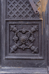old wooden door with metal door knocker
