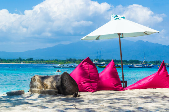 
Pink pillows on Gili Trawangan beach. Paradise beach on Gili island
