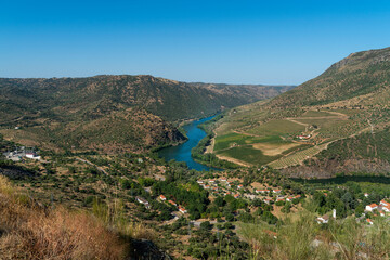 Aldeaduero at the viewpoint of Salto de Saucelle with the Duero River among the mountains running through the valley, Spain