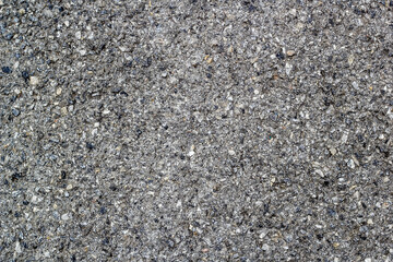 gray granite surface with small stones