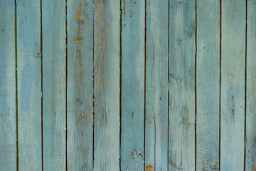 Distressed, worn, weathered, old, blue wooden panel abstract background.