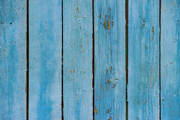 Fototapeta na wymiar Distressed, worn, weathered, old, blue wooden panel abstract background.