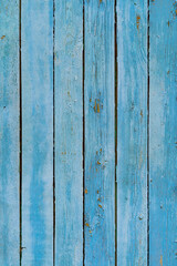 Distressed, worn, weathered, old, blue wooden panel abstract background.