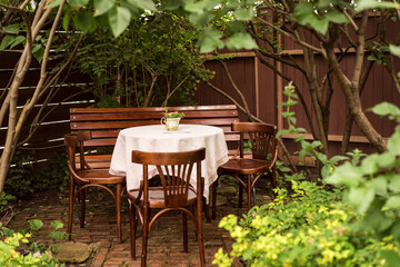 English back Garden Patio with table, chairs and parasol