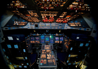 The space shuttle Atlantis flight deck all powered up at Kennedy Space Center, Florida - Powered by Adobe