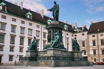 Fototapeta na wymiar View of Statue of Emperor Francis II in the Courtyard of Hofburg, Vienna Old Town