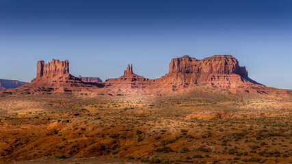 The towering sandstone Mitten Buttes and Mesas of the Navajo Nation's Monument Valley Navajo Tribal Park on the border of Arizona and Utah, United States