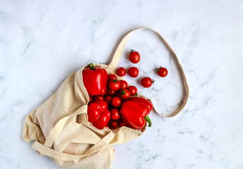 Obraz na płótnie Canvas Vegetables in linen reusable bag - eco-friendly concept.
