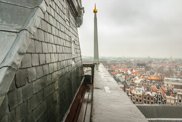 Golden lightning rod on the tower of the Old Church, Amsterdam - obrazy, fototapety, plakaty
