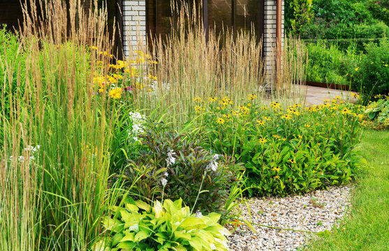 Amazing garden with perennials and "dry stream" and  typical  pavilion    in russian   prosperous village. - so named Belgian village