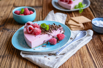 No bake raspberry cheesecake topped with fresh berries