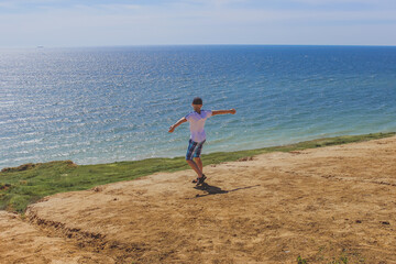 man running on the beach