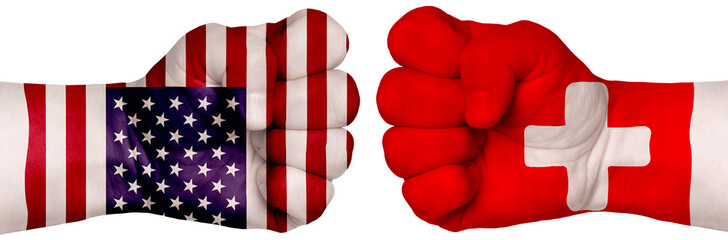 Two hands are clenched into fists and are located opposite each other. Hands painted in the colors of the flags of the countries. Switzerland vs USA