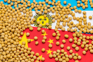 Flags of China and Argentina covered in soybeans. Concept of Chinese and South American agricultural imports, exports, trade agreement, trade war, tariffs, production and commodity markets