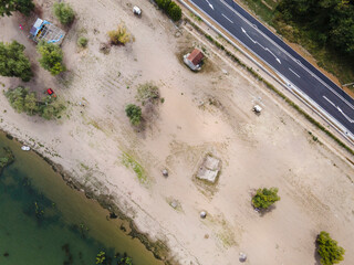 Top down aerial view on the sand beach by Danube river at Brza Palanka town destination with main...