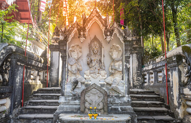 Phayao, Thailand - Dec 1, 2019: Indra and Follower Statue on Stone Platform with Natural Light in...