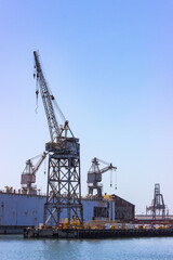 Fototapeta na wymiar Cranes and shipping near the Port of San Francisco