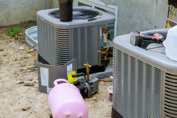 Air conditioning system assembled on performing preventive maintenance on air conditioning...