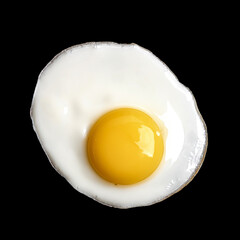 Closeup photo of fried egg isolated on black background