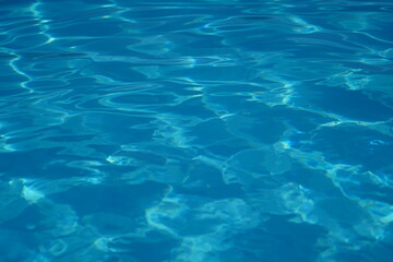 Fototapeta na wymiar blue pool water background texture