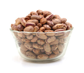 Pile Cranberry Bean in the glass bowl isolated on white background. Also called Borlotti Bean or Shell Bean. Cranberry beans are rounded with red specks.
