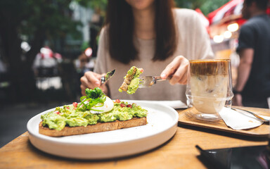 Guacamole avocado healthy food and asian woman background at outdoor restaurant on day