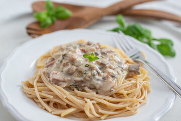 Spaghetti pasta with mushrooms and creamy sauce