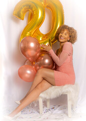 Birthday shoot for 20 yr old African American young lady with balloons 