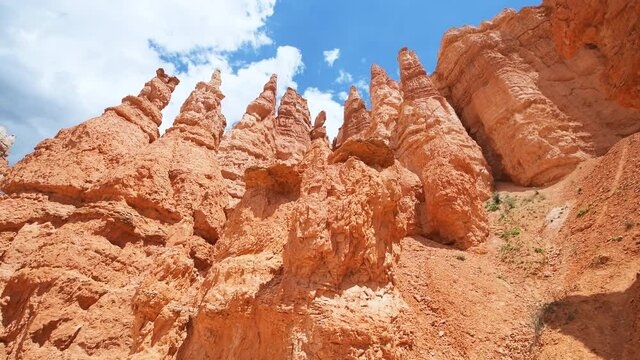Vertical panning wide angle view of hoodoos spires orange rock formations at Bryce Canyon National Park in Utah Queens Garden Navajo Loop trail