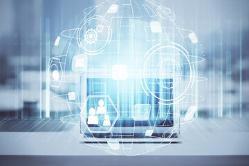 Computer on desktop with social network hologram. Double exposure. Concept of international people connections.