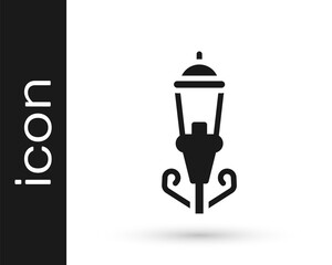 Black Vintage street light icon isolated on white background. Vector.