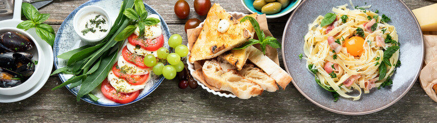 Italian cuisine on rustic wooden table